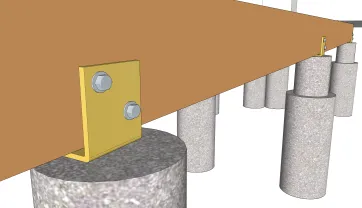 Die Befestigung der Lagerhölzer auf den Betonsockel